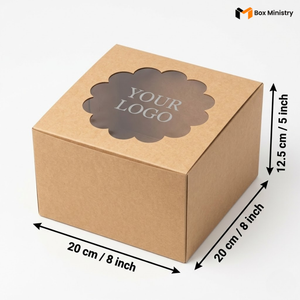 Natural kraft brown square cake box with ornate flower-shaped scalloped petal PVC window on lid showing "YOUR LOGO" text in elegant serif silver-grey font printed directly on the transparent PVC window surface, dimensions 20 x 20 x 12.5 cm (8 x 8 x 5 inches), shown in 3/4 isometric angle with bold black measurement arrows on right and bottom edges, visible tuck-lock flap on right side face, unbleached matte natural paper texture finish, on a soft pure white background