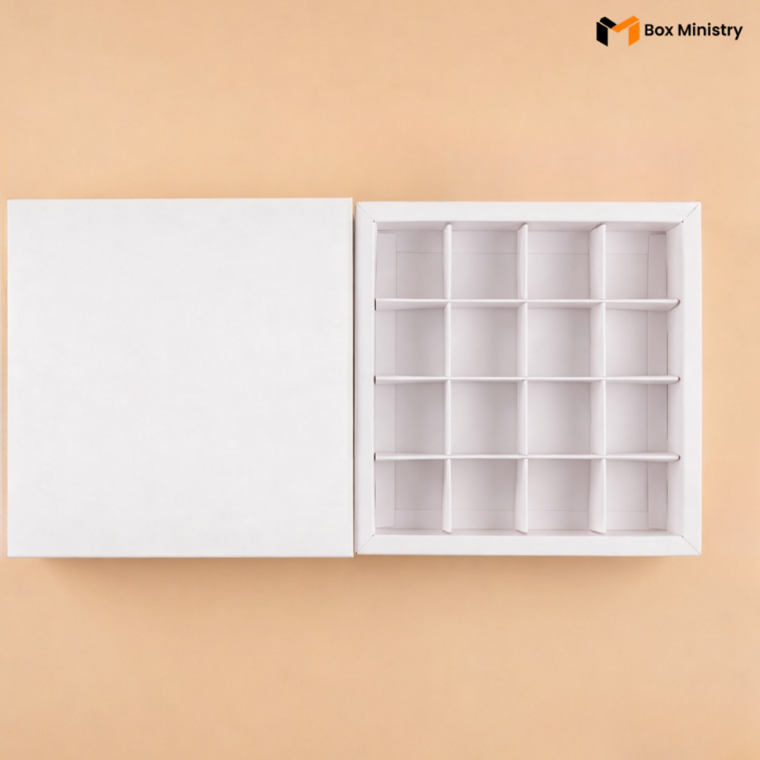 White jewelry box with compartments on a beige background, featuring 'Box Ministry' logo.