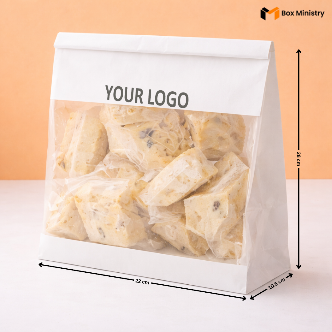 White stand-up pouch with clear window displaying food items, labeled 'Your Logo' on a peach background.