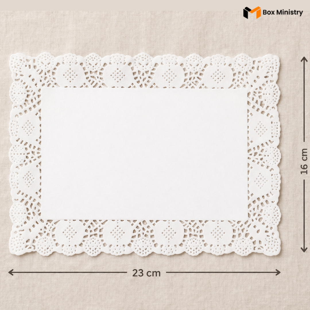 White paper doily with dimensions on a beige background