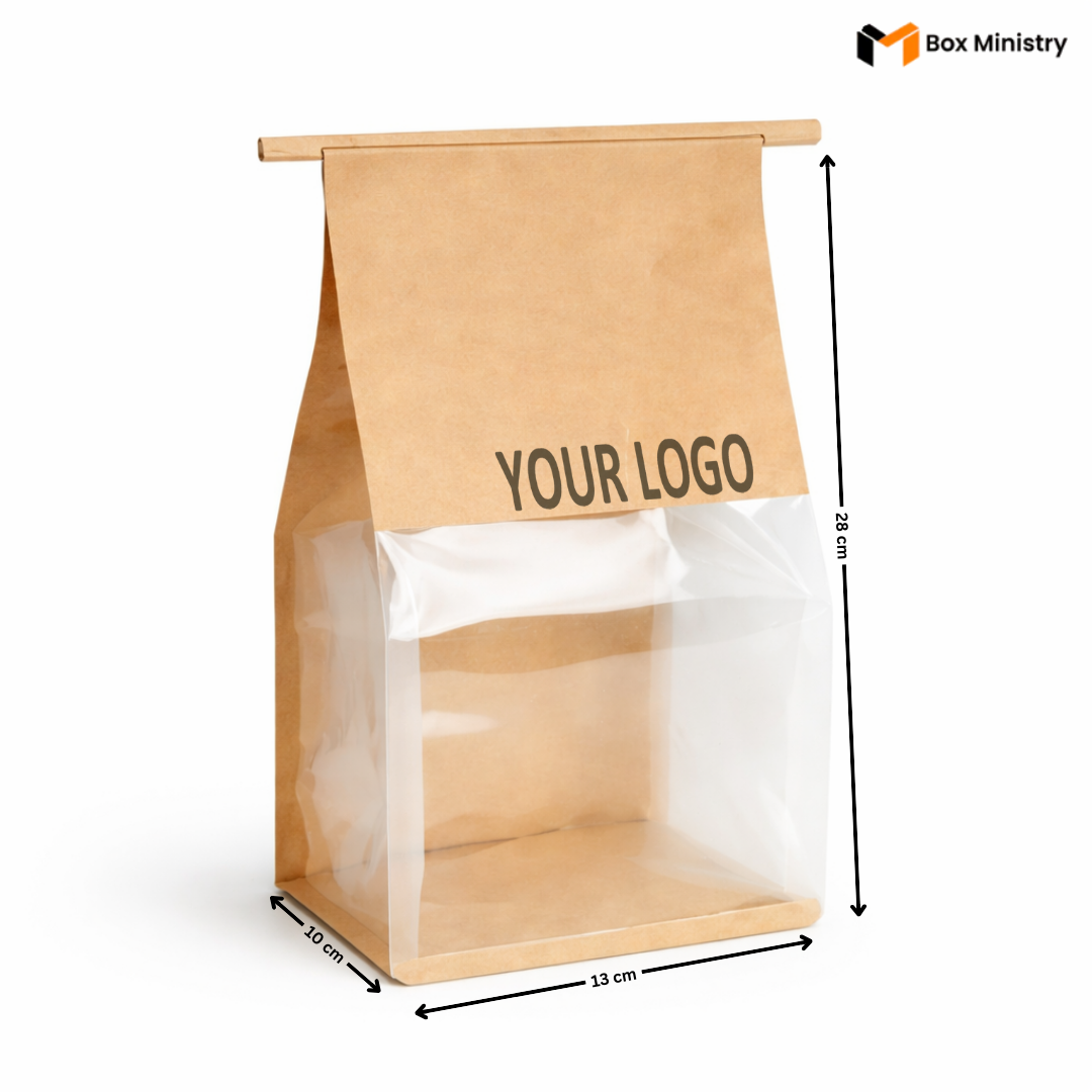 Kraft paper bag with clear window and dimensions labeled, featuring 'Box Ministry' logo.