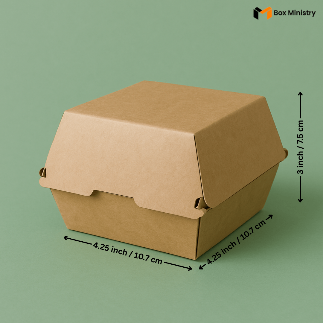 Brown cardboard box with dimensions labeled on a green background, featuring the 'Box Ministry' logo.