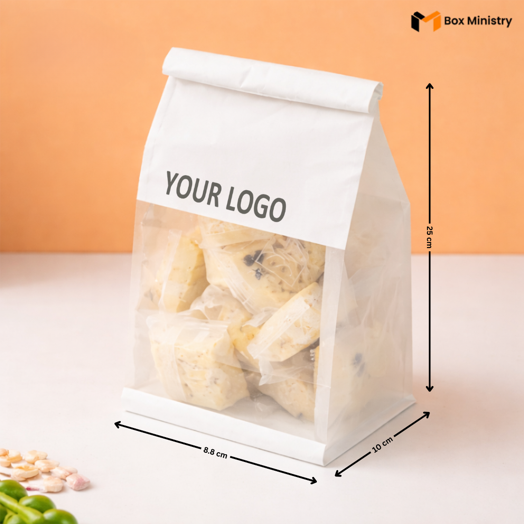 White stand-up pouch with clear front, filled with food items, on a light background with dimensions and 'Box Ministry' branding.
