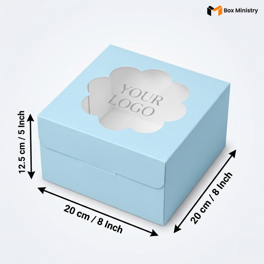 Soft sky blue square cake box with ornate flower-shaped scalloped petal PVC window showing "YOUR LOGO" text in elegant serif grey font, dimensions 20 x 20 x 12.5 cm (8 x 8 x 5 inches), shown in 3/4 isometric angle with bold black measurement arrows, visible side lock closure on front face, matte finish, on a soft light grey-white gradient background