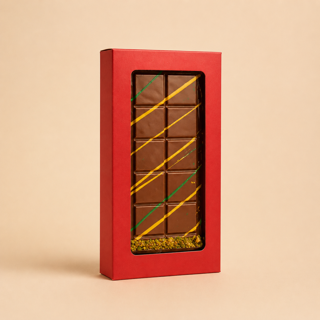 Red chocolate box with a grid of squares on a beige background