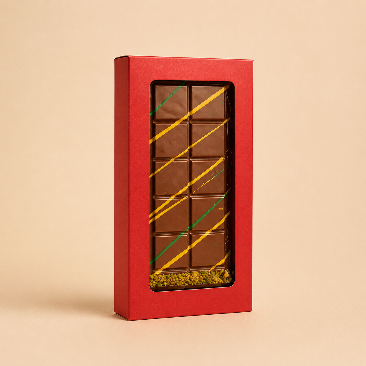 Red chocolate box with a grid of squares on a beige background