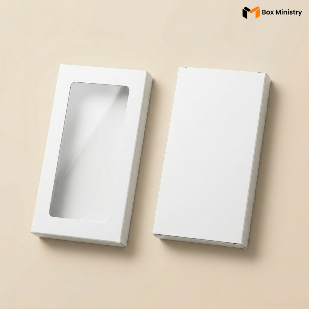 Two white cardboard boxes on a beige background with 'Box Ministry' branding.