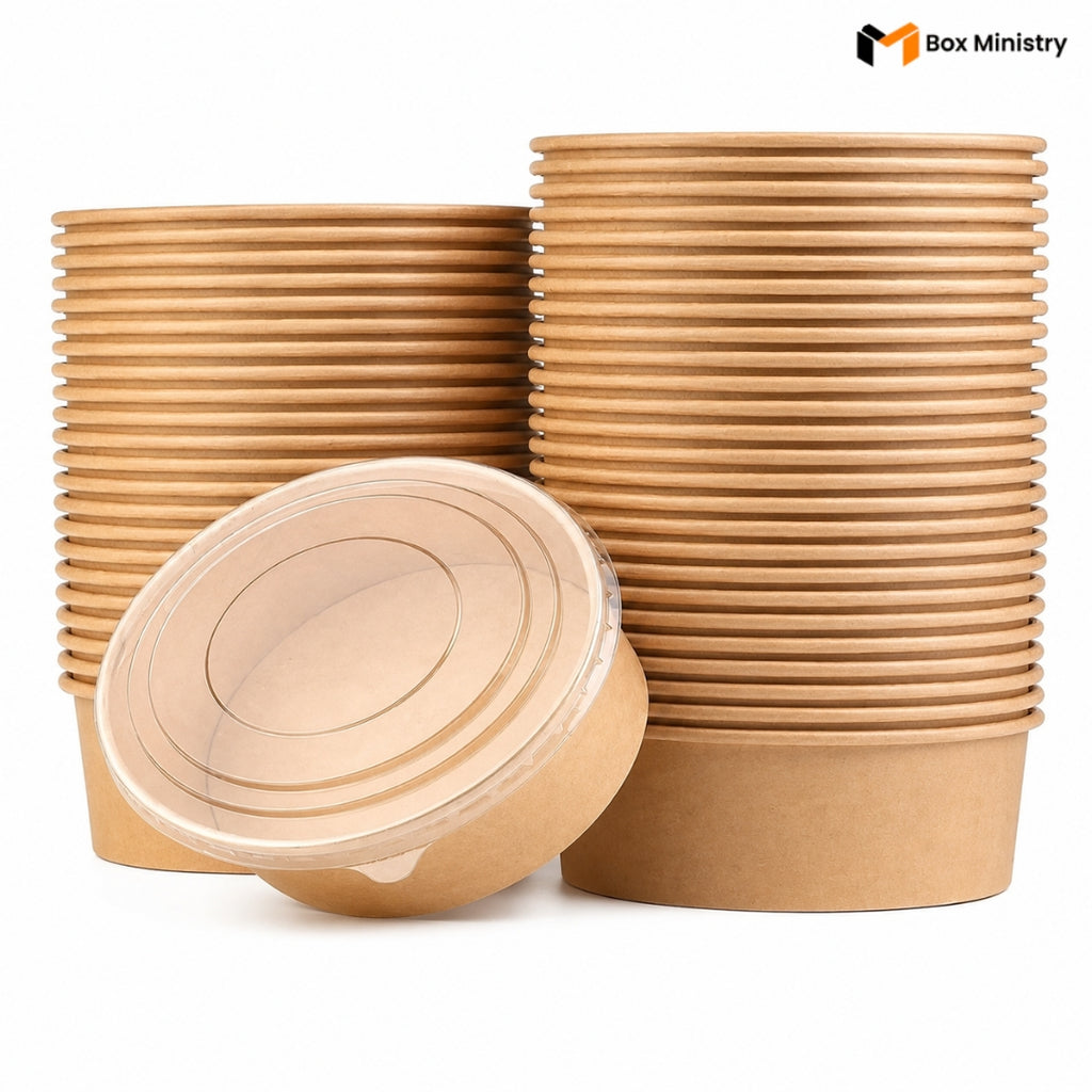 Stacks of brown paper cups with lids on a white background, featuring the Box Ministry logo.