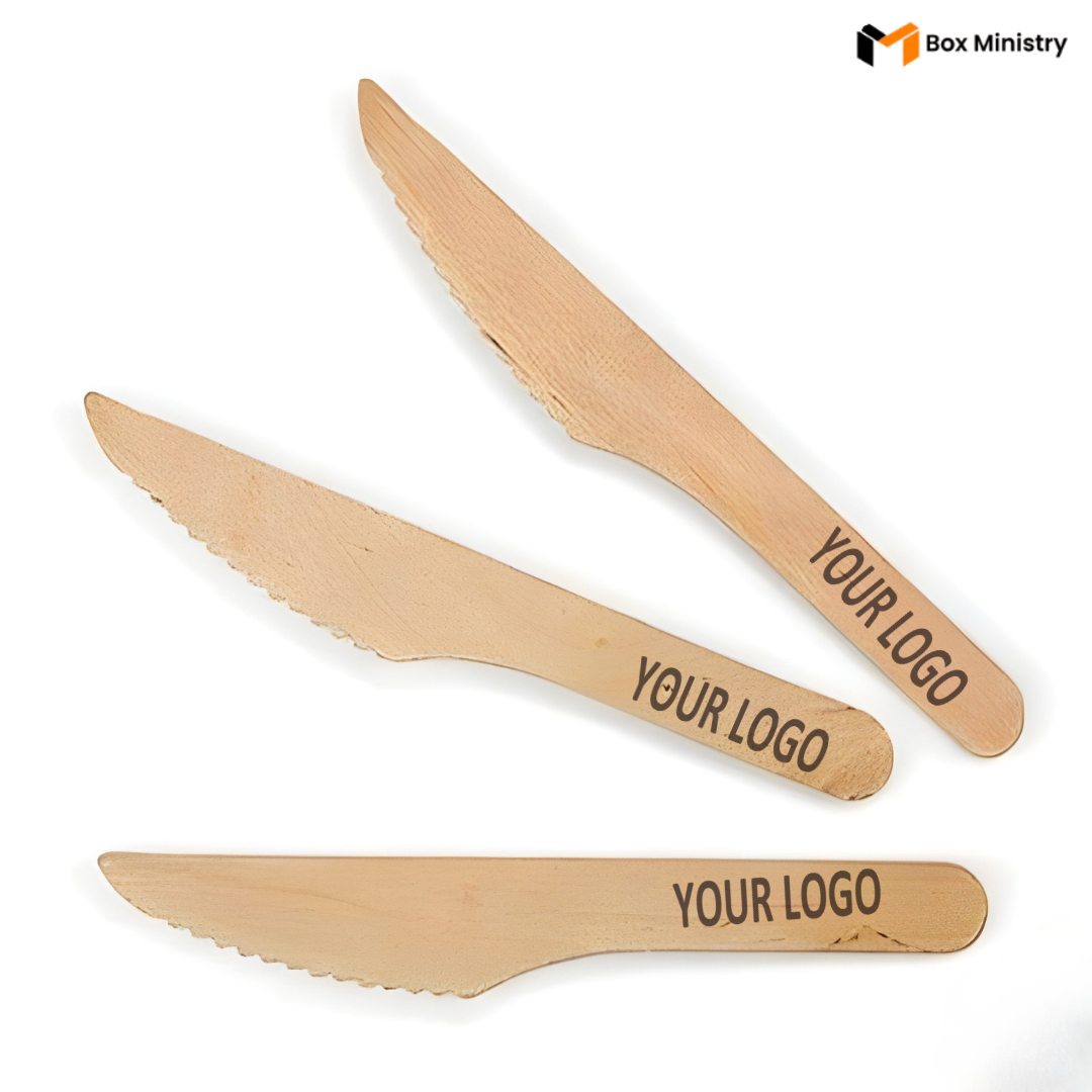 Three wooden knives with 'YOUR LOGO' engraved on them against a white background.