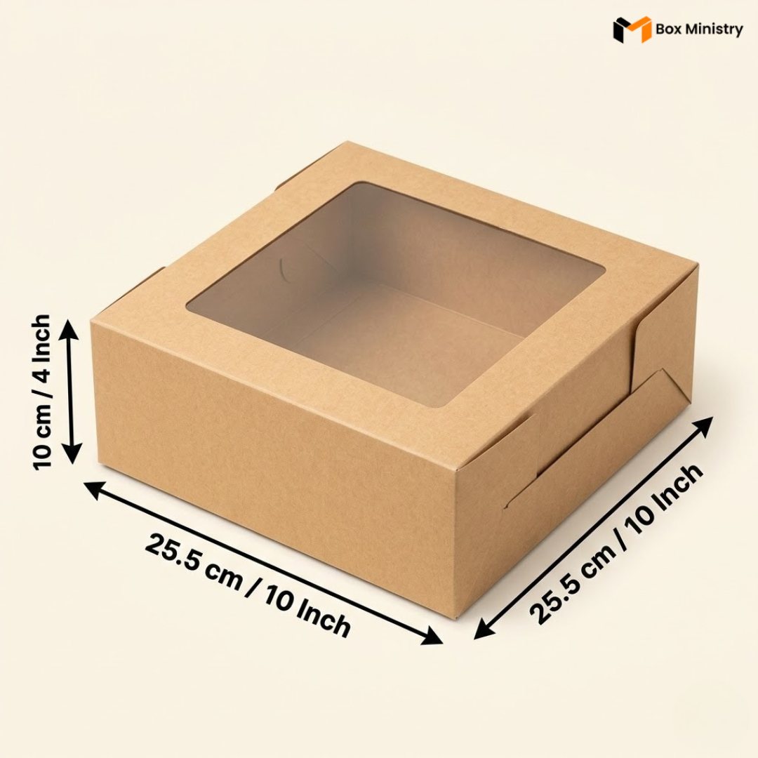 Kraft brown cake box with transparent PVC window lid, dimensions 25.5 x 25.5 x 10 cm (10 x 10 x 4 inches), shown in isometric view on a cream background