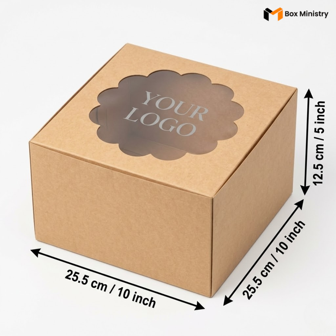 Natural kraft brown square cake box with ornate flower-shaped scalloped petal PVC window on lid showing "YOUR LOGO" text in elegant serif silver-grey font printed directly on the transparent PVC window surface, dimensions 25.5 x 25.5 x 12.5 cm (10 x 10 x 5 inches), shown in 3/4 isometric angle with bold black measurement arrows on right and bottom edges, visible tuck-lock flap on right side face, unbleached matte natural paper texture finish, on a soft pure white background

