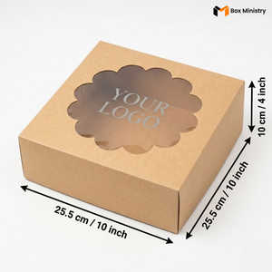 Natural kraft brown square cake box with ornate flower-shaped scalloped petal PVC window on lid showing "YOUR LOGO" text in elegant serif silver-grey font printed directly on the transparent PVC window surface, dimensions 25.5 x 25.5 x 10 cm (10 x 10 x 4 inches), shown in wider 3/4 isometric angle revealing more of the lid surface, visible tuck-lock flap on right side face, unbleached matte natural paper texture finish, on a soft pure white background
