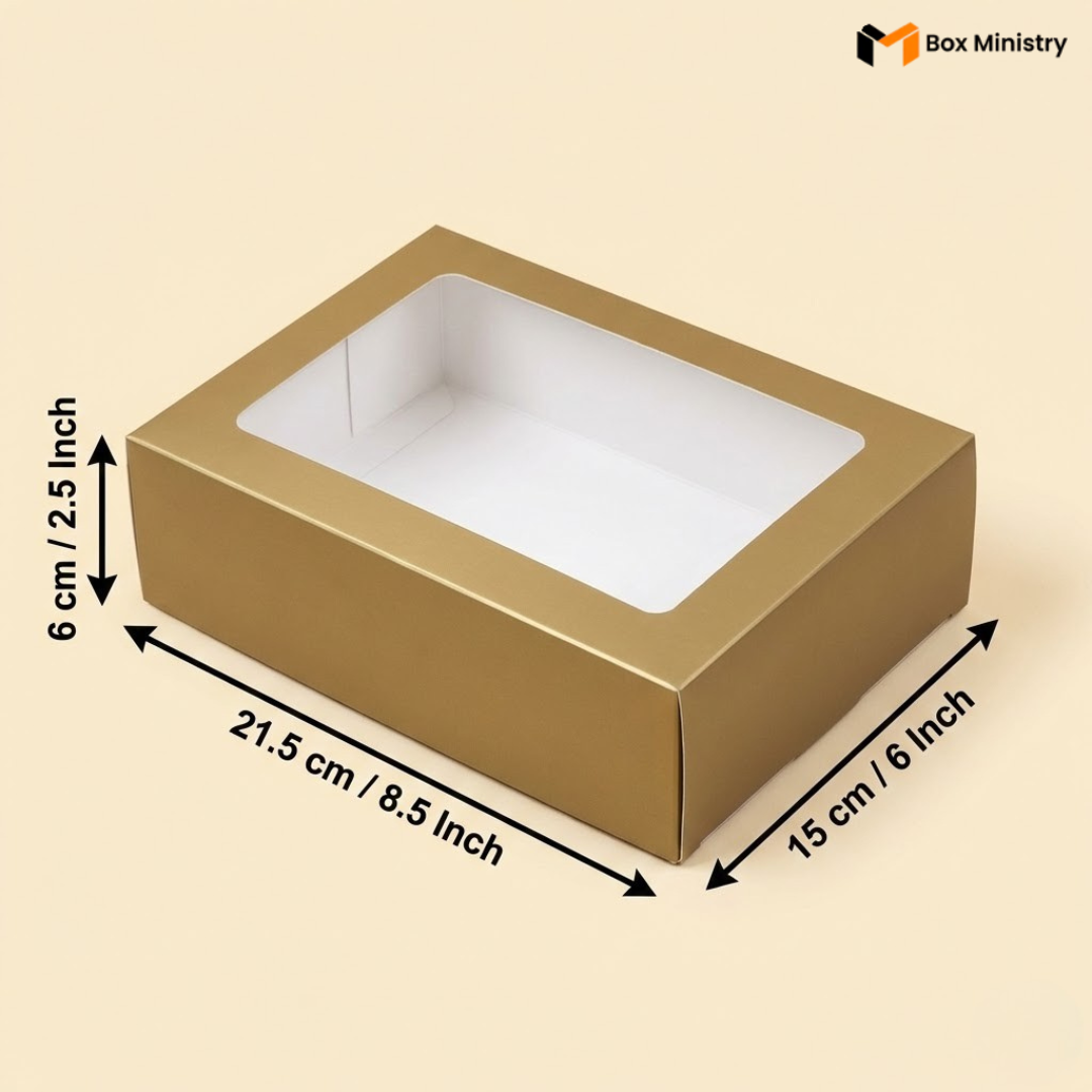 Matte Gold box with a clear window and measurements on a Creme background, featuring the Box Ministry logo.