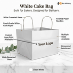 White cake bag with features highlighted on a marble surface, branded 'Box Ministry'.