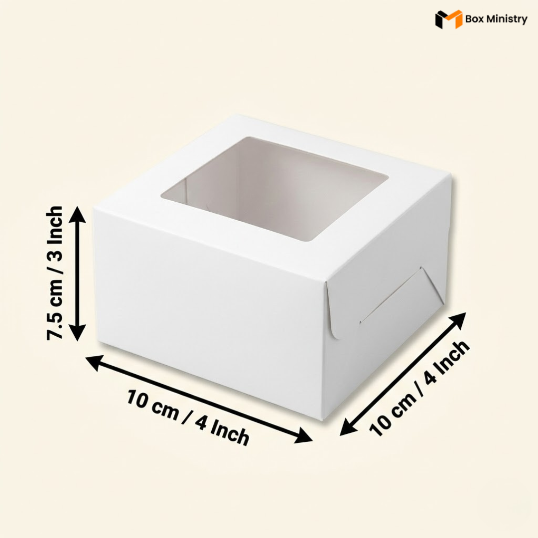 White square window cake box 10x10x7.5 cm (4x4x3 inch) smallest mini size with clear square PVC window on top showing white interior, compact square shape with dimensions labeled with measurement arrows on warm pale cream background — White Square Window Cake Box 