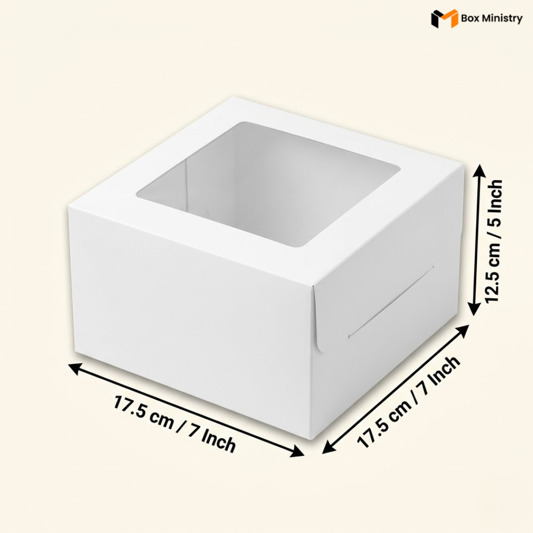 
White square window cake box 17.5x17.5x12.5 cm (7x7x5 inch) with large clear square PVC window on top showing white interior, taller 5 inch height version clearly visible, dimensions labeled with measurement arrows on warm pale cream background — White Square Window Cake Box
```
