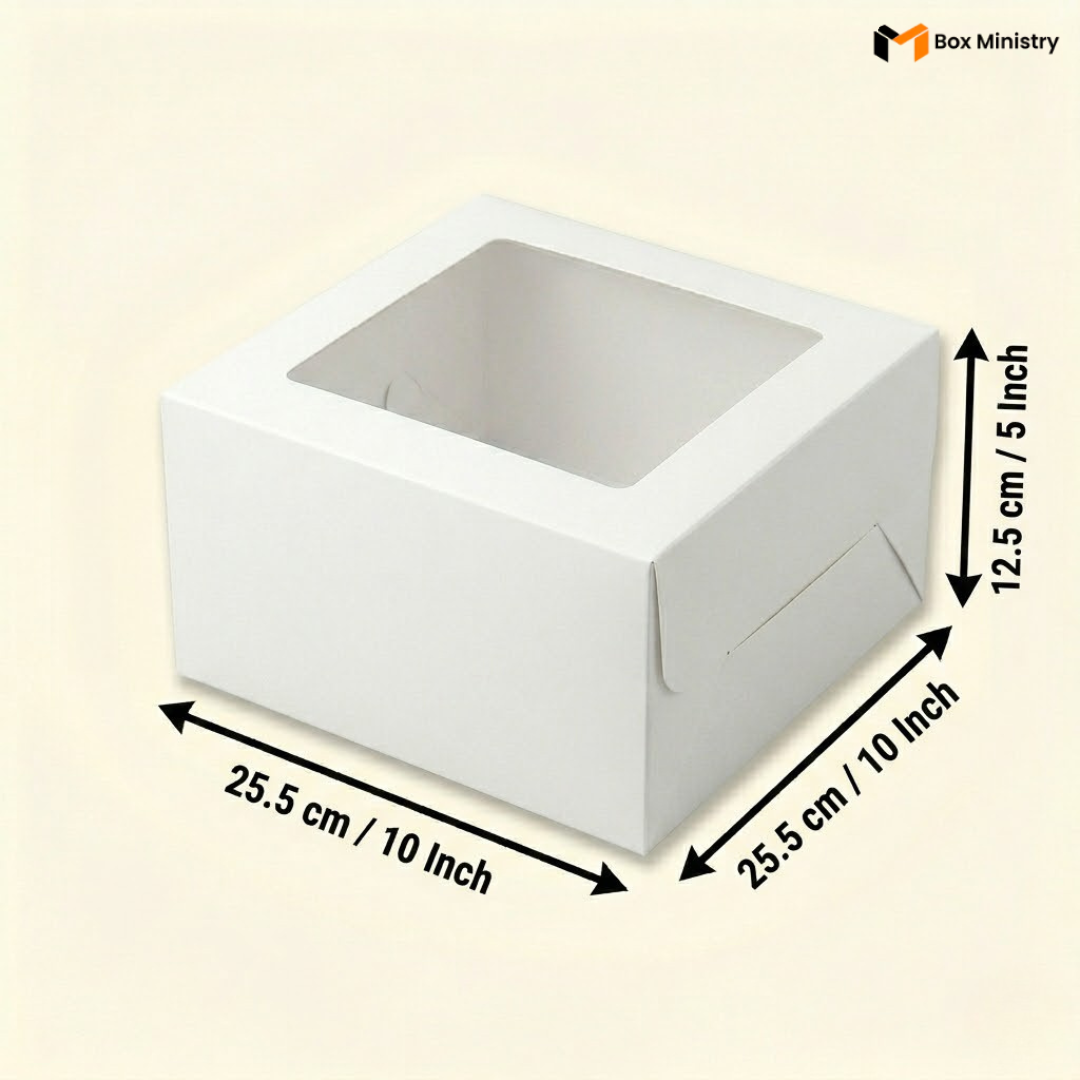 White square window cake box 25.5x25.5x12.5 cm (10x10x5 inch) with large clear square PVC window on top showing white interior, large footprint with 5 inch height clearly visible, dimensions labeled with measurement arrows on warm pale cream background — White Square Window Cake Box 