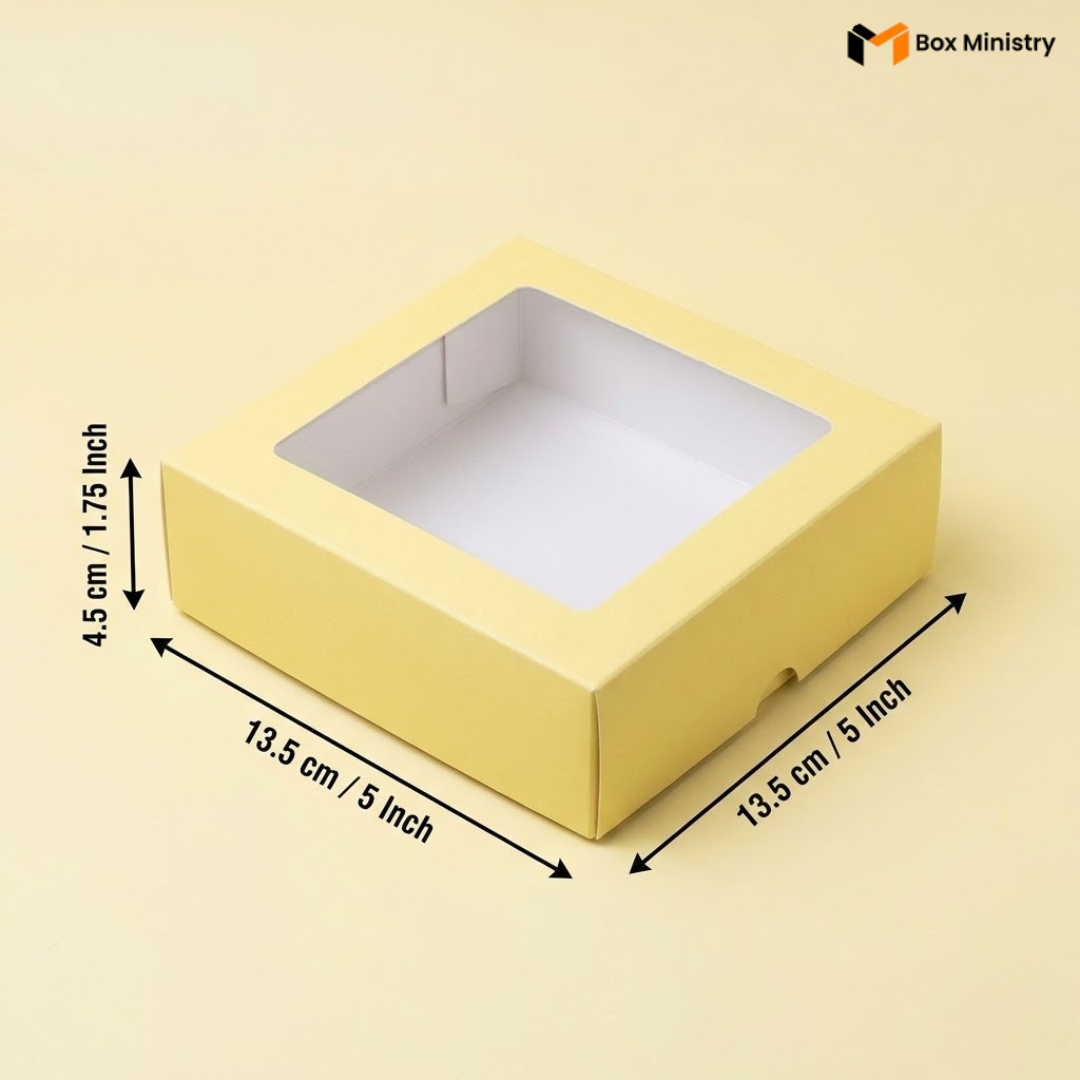Yellow box with a clear window and measurements on a white background