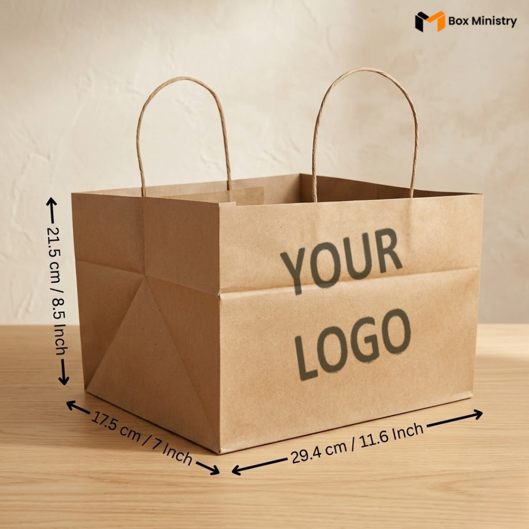 Brown paper bag with dimensions and 'Your Logo' text on surface, featuring Box Ministry branding.