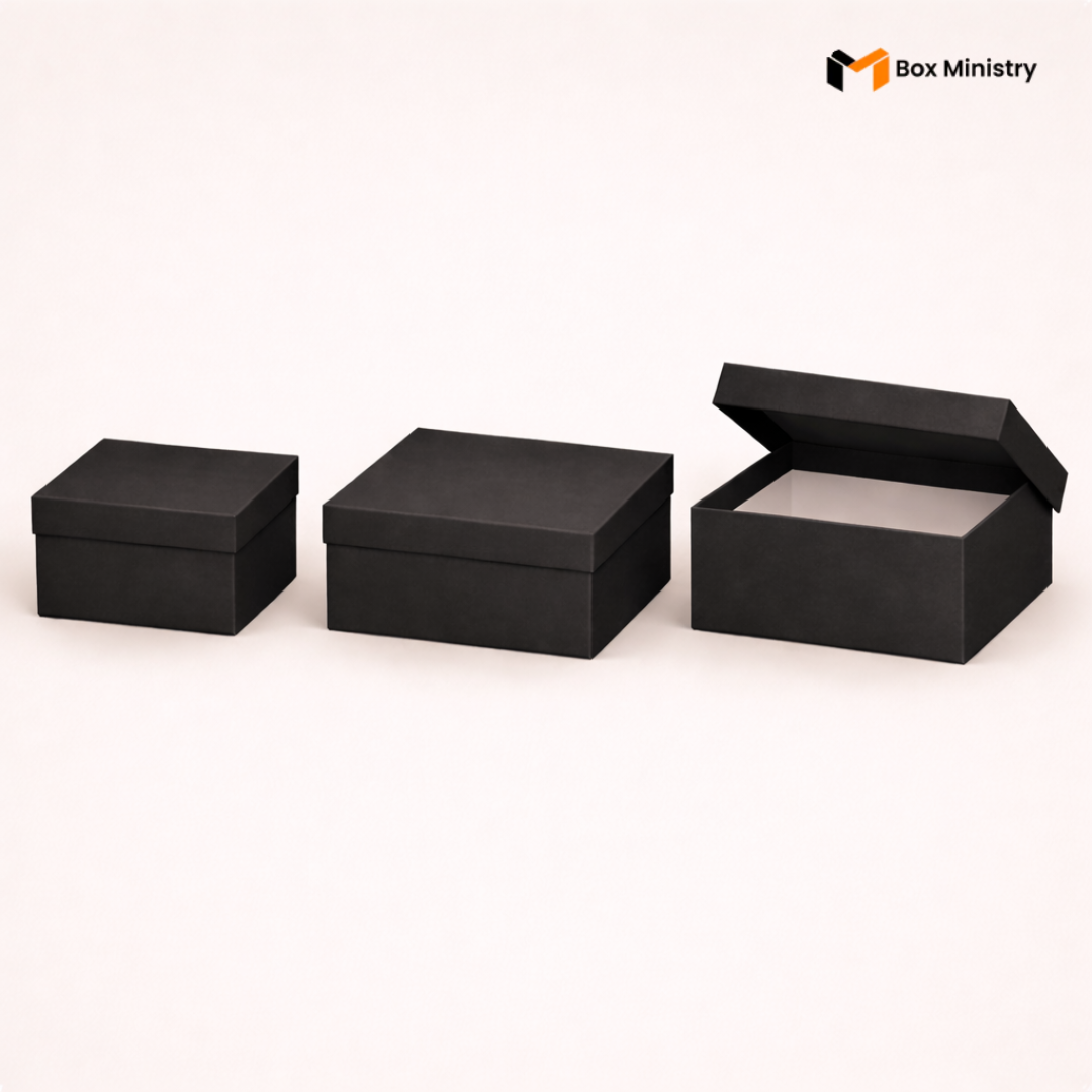 Three black cardboard boxes of different sizes on a white background with 'Box Ministry' branding.