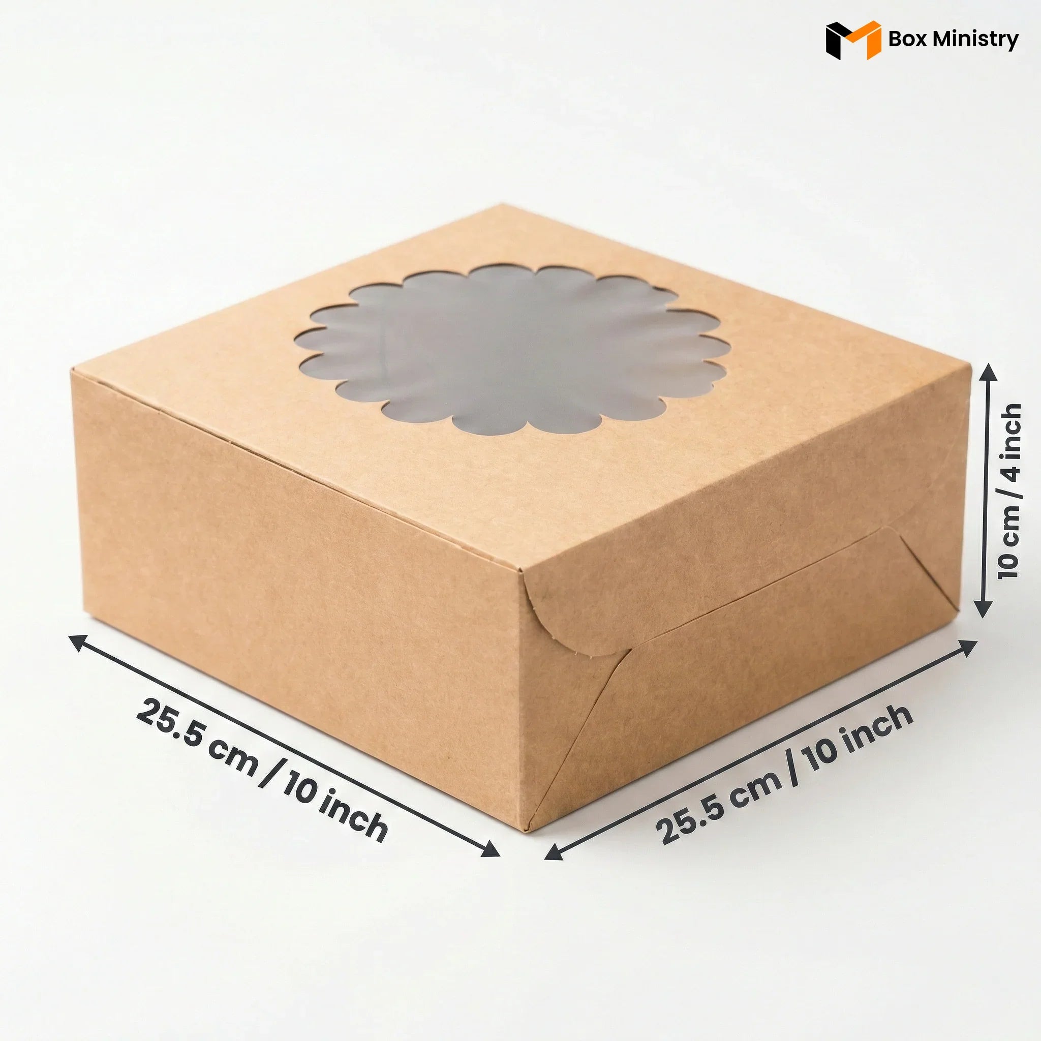 Natural kraft brown square cake box with ornate flower-shaped scalloped petal PVC window on lid, no logo, dimensions 25.5 x 25.5 x 10 cm (10 x 10 x 4 inches), shown in 3/4 isometric angle with bold black measurement arrows on right and bottom edges, visible tuck-lock flap on right side face, unbleached matte natural paper texture finish, on a soft pure white background
