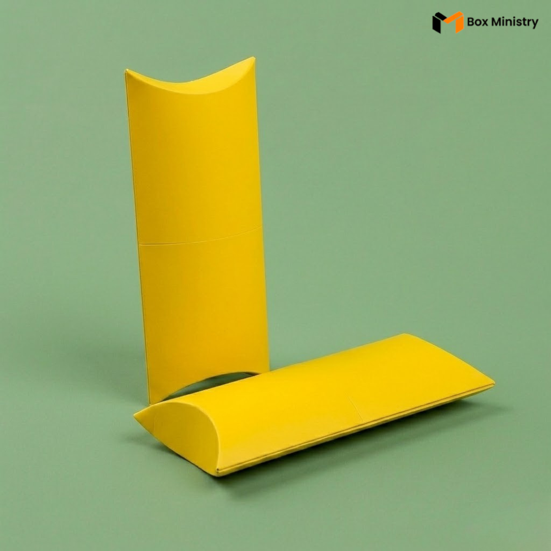 Yellow pillow-shaped box on a green background with 'Box Ministry' branding.